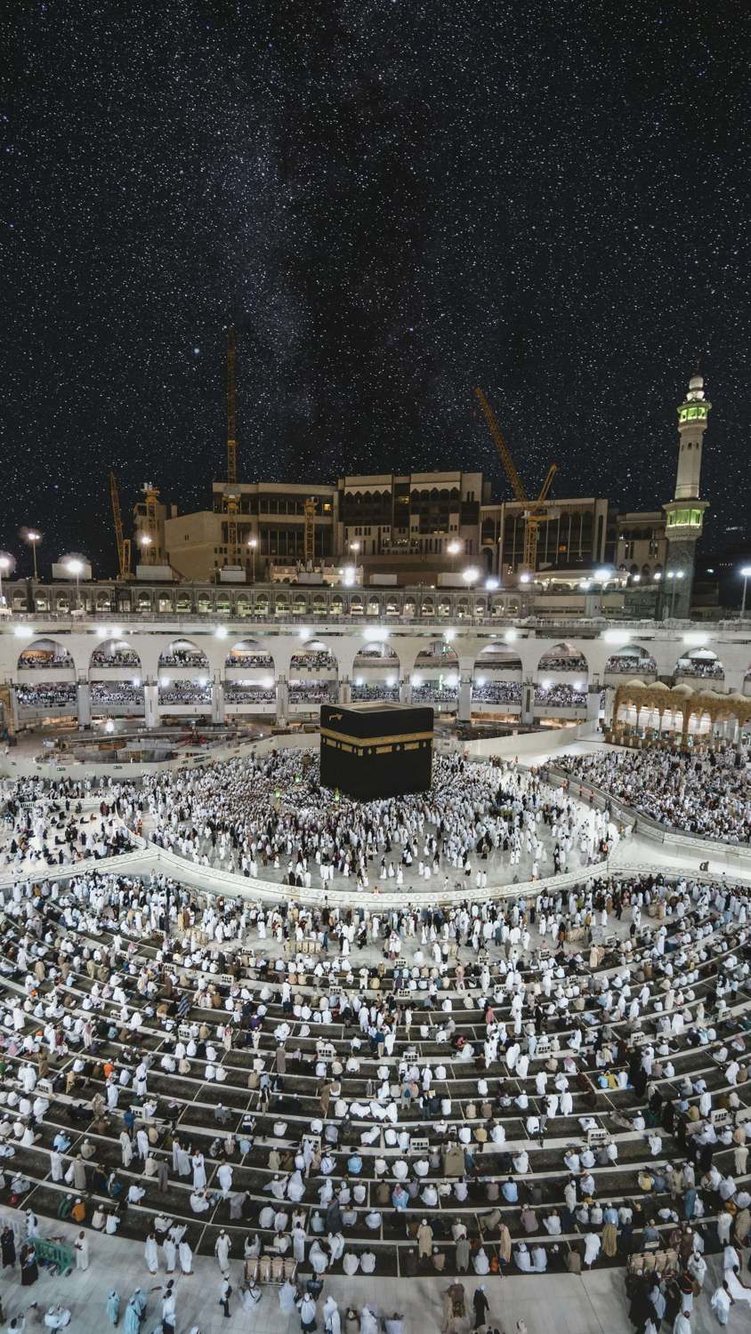 Masjid al-Haram lit at night, seen from above